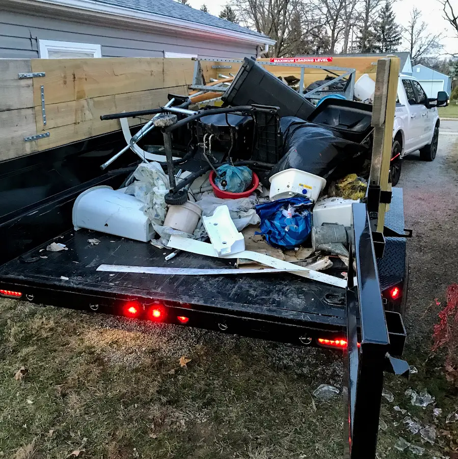 Roll-off dumpster delivered to a residential driveway in Savage